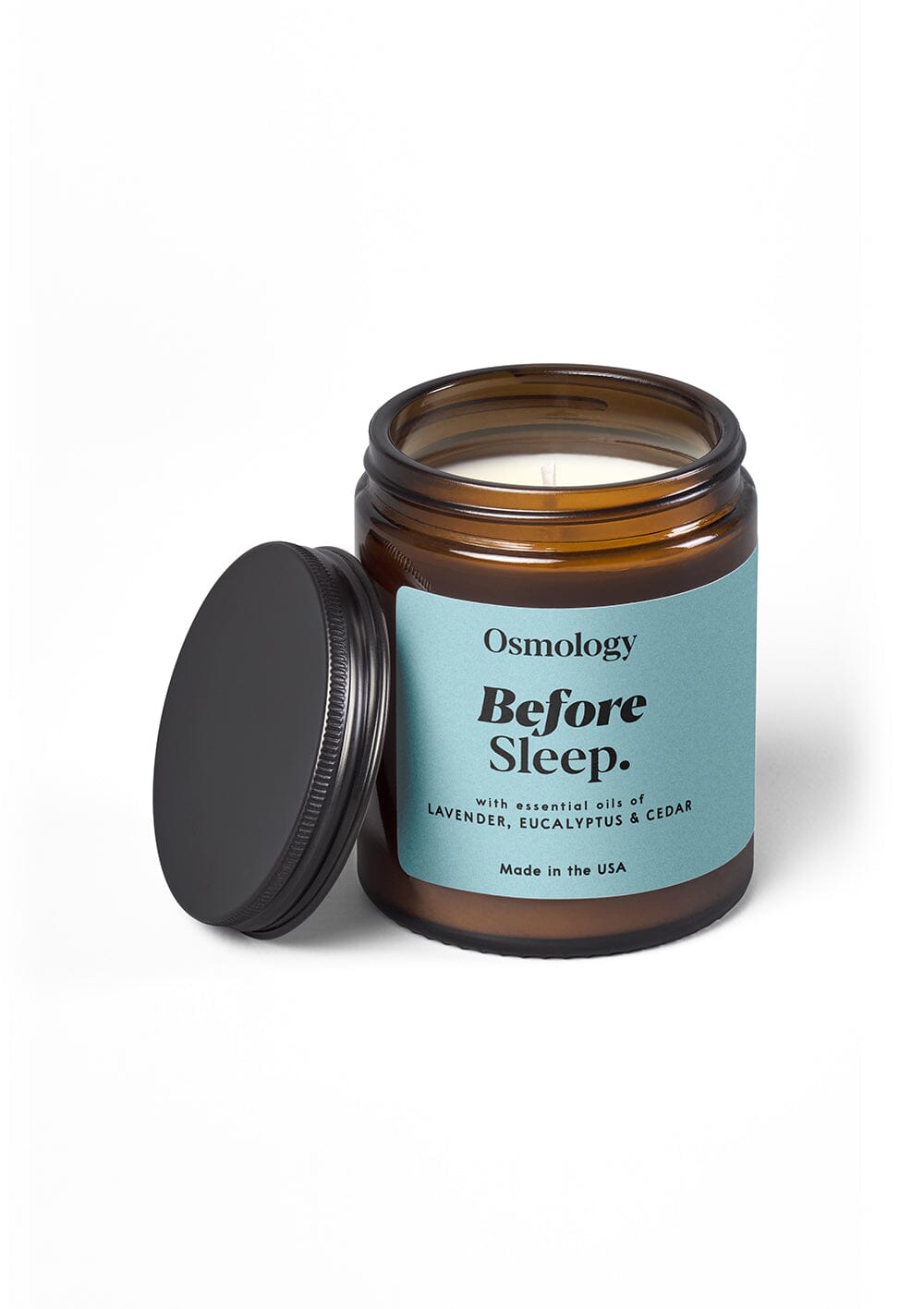 Osmology Before Sleep jar candle, a brown glass jar with light blue sticker and black lid
