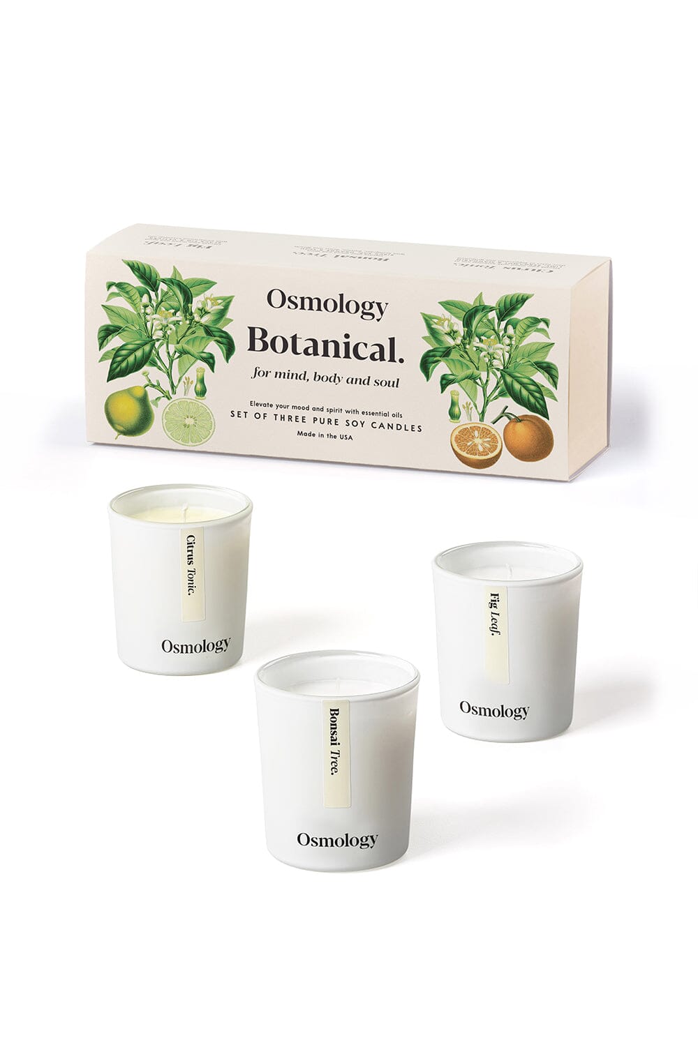 Osmology Botanical gift set of mini candles displayed next to product packaging against a white background