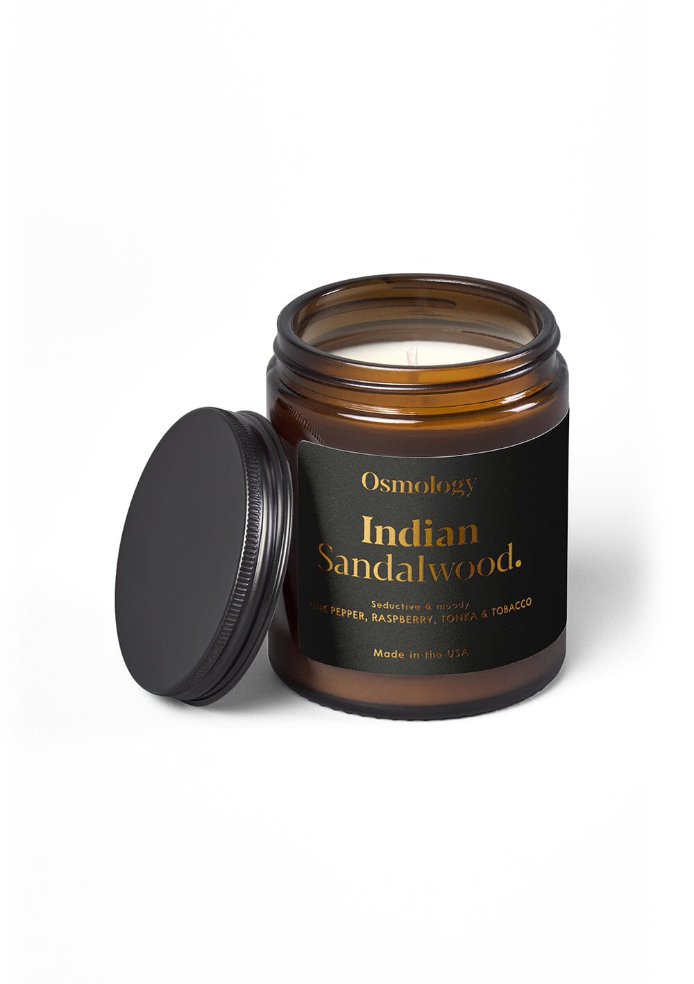 Osmology Indian Sandalwood jar candle with open lid on white background